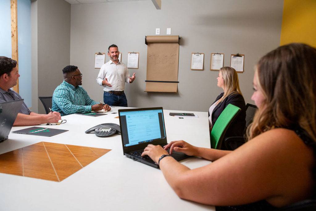 business colleagues meeting together in conference room