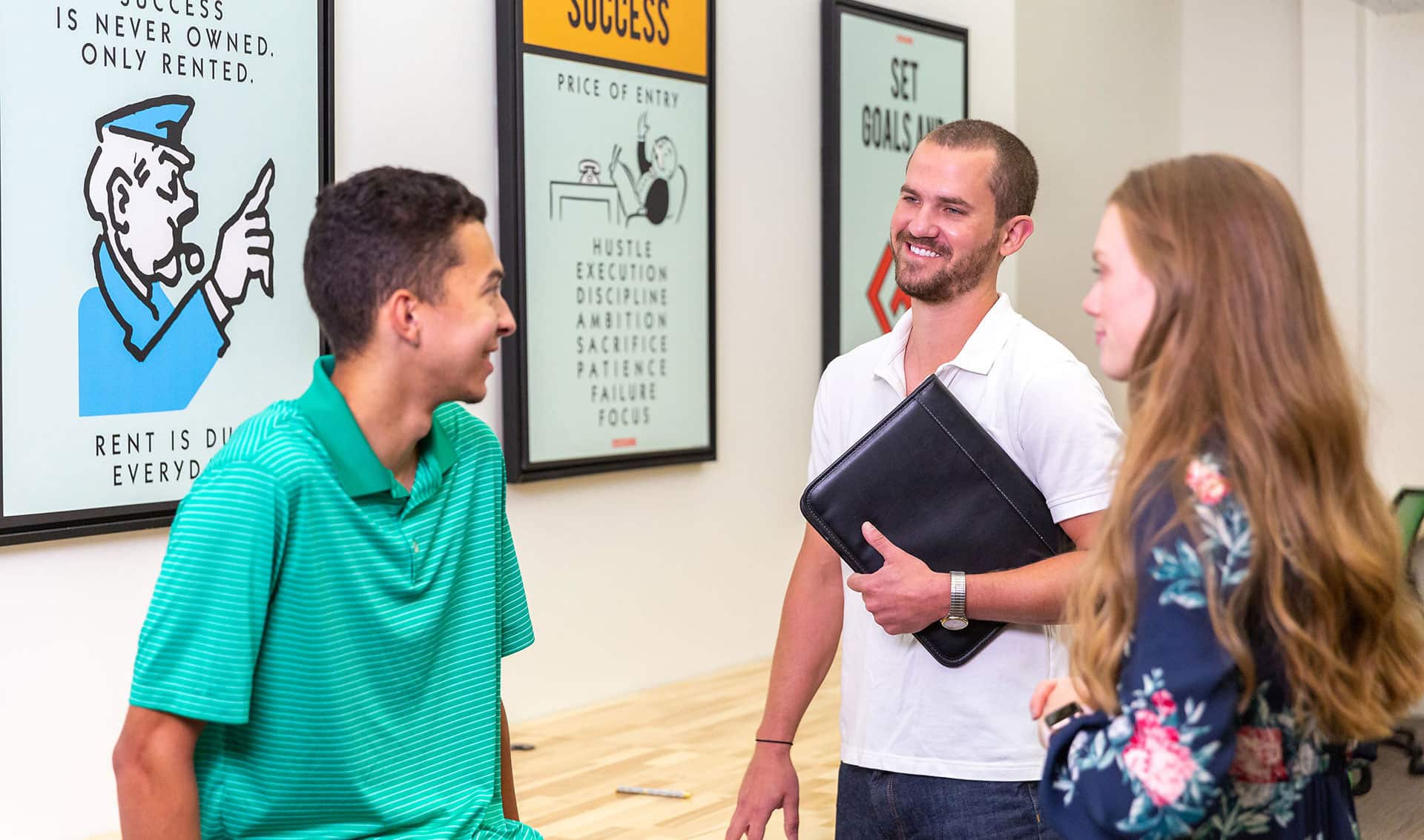 professionals meeting with young man