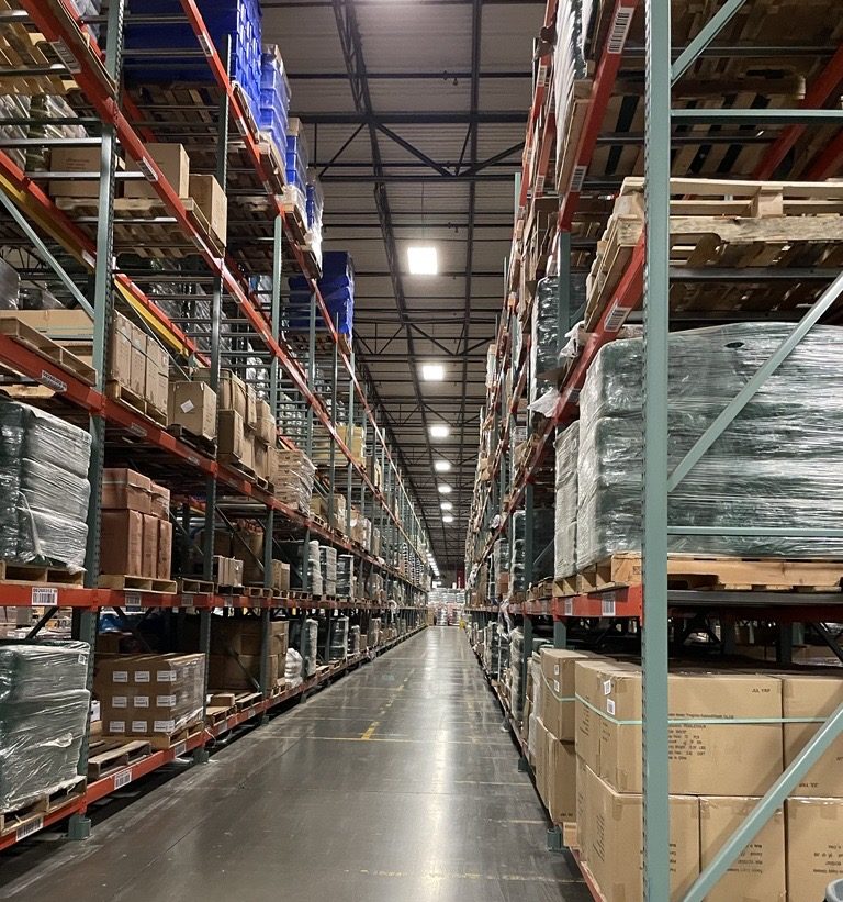 Warehouse with shelves stocked full of inventory