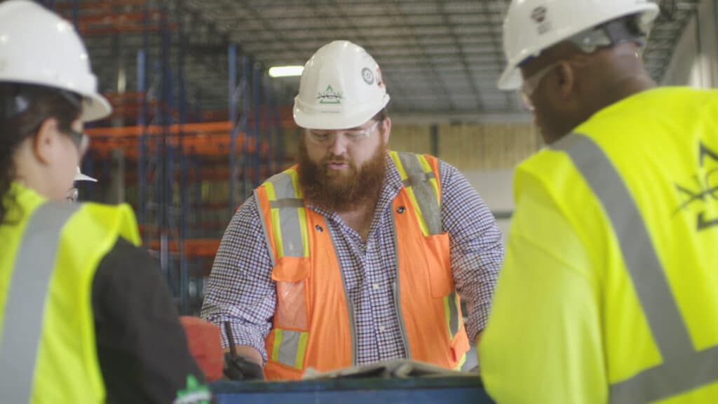 A construction superintendent is give his construction laborers details for their next job