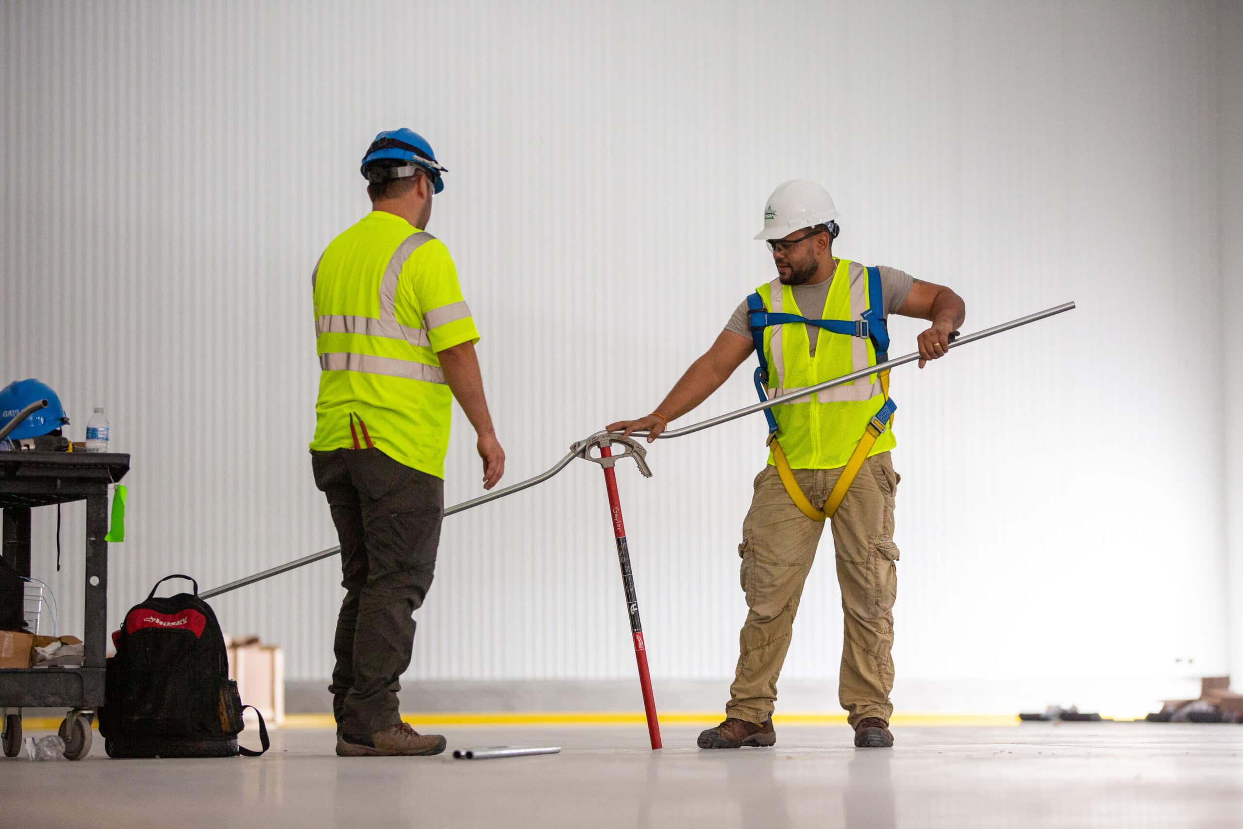Construction Workers Assessing Levelness